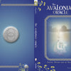 The Avalonian Oracle by Schiffer Publishing, Ltd. features a stone medallion with Celtic designs on the left and a mystical Priestess raising a sword from water on the right, framed by ornate borders and yellow wildflowers.