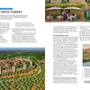 Aerial view of Monteriggioni, a Tuscan hilltown with stone walls. On the right, people relax at a café with greenery. "Secret Cities of Italy" by Schiffer Publishing, Ltd. explores the town’s rich history and hidden charm.