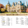 The image for "At Home with Royalty" by Schiffer Publishing, Ltd. shows a grand castle hotel with towers by a reflective waterway, surrounded by autumn trees beneath a blue sky, with a menu list displayed at the bottom.
