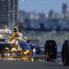 A high-speed Formula 1 car sparks as it scrapes the track, with a blurred backdrop highlighting the action. "Inside Formula 1" by Schiffer Publishing, Ltd. is ideal for fans who love dynamic racing photography, featuring bold text on the right.