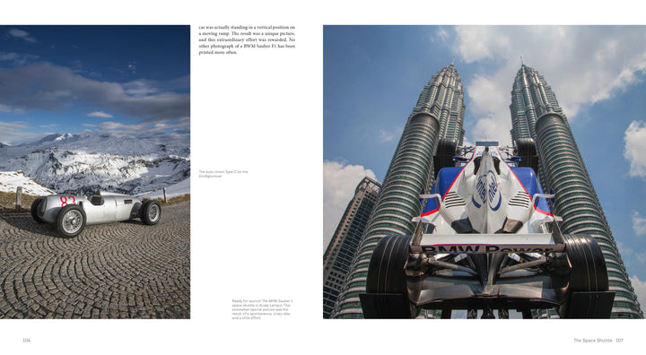 A vintage BMW race car rests on cobblestones in snowy mountains. Next, an automotive photographer captures a BMW Formula 1 car before the Petronas Twin Towers—scenes featured in "Inside Formula 1" by Schiffer Publishing, Ltd.