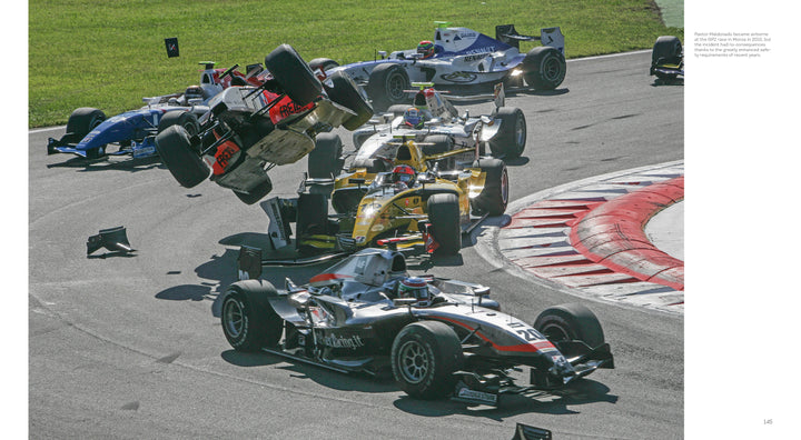A dramatic moment from Inside Formula 1 by Schiffer Publishing, Ltd.: multiple open-wheel cars crash near red and white curbs, one airborne with debris flying—an intense scene captured in Formula 1 racing photography.