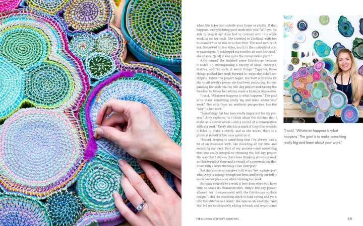 A woman smiles at a table with colorful, circular crocheted art from "Threads of Treasure" by Schiffer Publishing, Ltd. On the left, her hand embroiders vibrant patterns, inspiring today’s modern crafters.