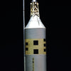 The "Model Rocketry" by Schiffer Publishing, Ltd. features a vintage silver rocket with black and yellow checks, base fins, and UNITED STATES along the side—evoking the golden age of space flight against a black backdrop.