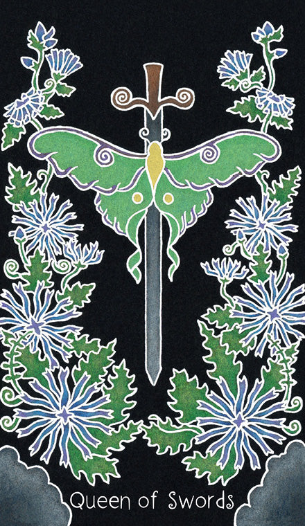 The Animystic Tarot by Schiffer Publishing, Ltd. features a Queen of Swords card with a central sword, a green moth, blue and white flowers, and lush leaves, reflecting the deck’s nature-inspired style on a striking black background.