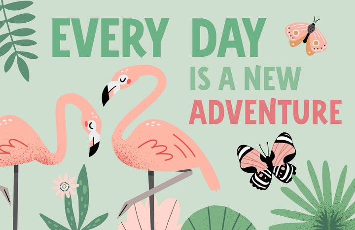 Two pink flamingos stand amid tropical leaves, flowers, a butterfly, and moth. Text reads: Every day is a new adventure. The pale green background adds playfulness to Schiffer Publishing's KindKids Super Awesome Puzzle Collection.