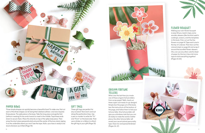 A craft book spread features a wrapped gift, handmade paper bows, floral gift tags, and origami fortune tellers—plus stickers from the KindKids Super Awesome Sticker Activity Book by Schiffer Publishing—arranged on white with green foliage.