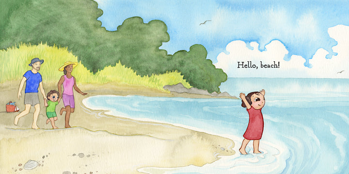 A child in a red dress greets the ocean with joy, arms raised, while three adults and another child explore the sandy beach under a blue sky. "Hello, Beach!" by Schiffer Publishing, Ltd. captures the magic of a seaside adventure.