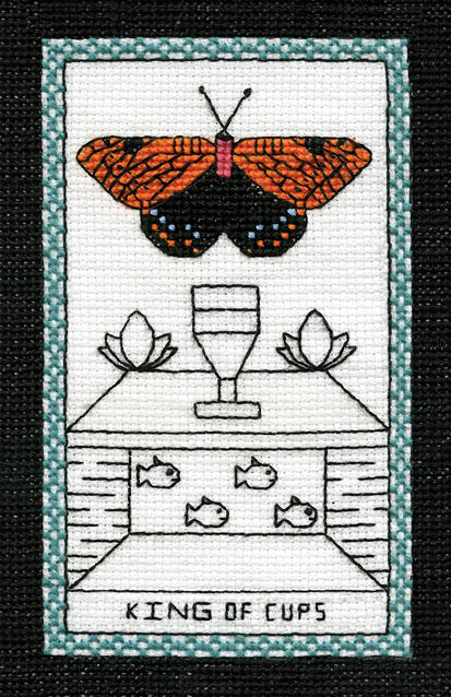 The Butterfly Wisdom Tarot by Schiffer Publishing, Ltd. features a red and black butterfly above flowers and a cup, with four fish below. The KING OF CUPS card symbolizes transformative healing.