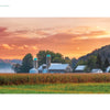 Capture the charm of Pennsylvania at sunset with "Back Roads of the Mid-Atlantic States" by Schiffer Publishing, Ltd.—featuring white barns, silos, lush crops, and tree-covered hills beneath a vivid sky in this picturesque landscape.