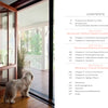 A fluffy white dog stands inside by an open glass door, looking out onto a porch with white railings and greenery. Beside the image is a table of contents for "Contemporary Southern Vernacular" by Schiffer Publishing, Ltd.