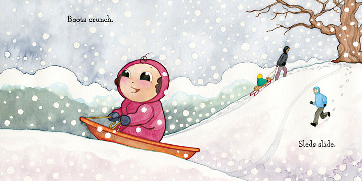 A child in a pink snowsuit sleds down a snowy hill with a smile in "Hello, Snow!" from Schiffer Publishing, Ltd. In the background, others pull sleds and walk nearby as snow falls—a delightful winter sensory book scene.