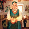 A woman with a pot of gold, inspired by Slavic heritage, features in The Ukrainian Tarot from Schiffer Publishing, Ltd.