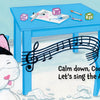 A smiling cat and a mouse enjoy music together in "Calm Down, Coco" by Schiffer Publishing, Ltd.—a social-emotional board book with playful art and a soothing ABC song.