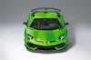 The Automobili Lamborghini Special Edition by Schiffer Publishing, Ltd. features a bright green sports car with sharp headlights, a large rear wing, and the sleek angular design signature to Lamborghini, set against a plain gray background.