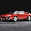 The Automobili Lamborghini Special Edition by Schiffer Publishing, Ltd. is showcased as a classic red sports car with a sleek, angular design and pop-up headlights, parked on a smooth surface against a dark background.