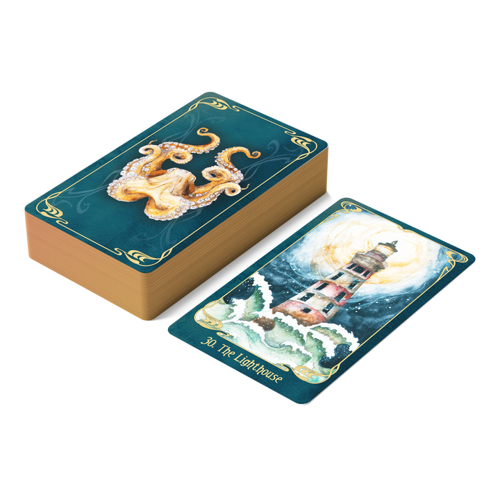 A deck of teal Oracle of the Mythical Ocean cards featuring an octopus, with one card placed face-up showing a lighthouse amidst crashing waves and the text 30. The Lighthouse.