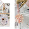 A fashion spread for Schiffer Publishing, Ltd.'s "The Painter's Wedding" shows a woman in a pale blue dress and green cardigan with pastel flowers, vintage decor, close-ups, and plates for a soft, romantic wedding vibe.