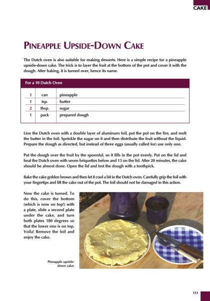 A recipe page for pineapple upside-down cake baked in a Schiffer Publishing, Ltd. Dutch Oven, with a photo of the round cake topped with pineapple rings beside a plate, fork, and spatula on a purple checkered cloth—perfect for campfire cooking.