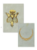 Monet by Schiffer Publishing, Ltd. features two hand-drawn vintage jewelry designs on gray paper: a gold flower brooch with textured petals and an elegant gold necklace with geometric patterns.