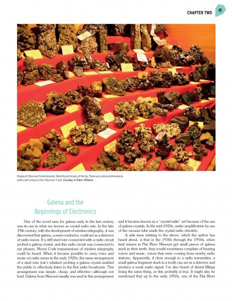 Photo of Galena mineral specimens on red display with info cards, featured in "Mineral Treasures of the Ozarks" by Schiffer Publishing, Ltd., illustrating Galena’s electronic uses and importance among Ozarks minerals.
