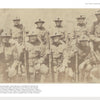A sepia-toned vintage photo, featured in Forgotten Soldiers of World War I by Schiffer Publishing, Ltd., shows America’s foreign-born soldiers posing with rifles outdoors during WWI.