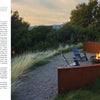 A copper-hued curved bench encircles a fire pit amid grasses and trees at sunset—capturing the inviting spirit of Northern California gardens. "Regional Landscape Architecture: Northern California" by Schiffer Publishing, Ltd. appears on the left.