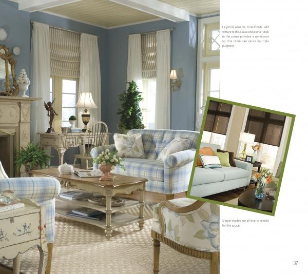 Design on the Fly" by Schiffer Publishing, Ltd. features a classic living room with blue plaid sofas, beige coffee table, light walls, large windows with shades, and a decorative armchair—timeless interior design inspiration.