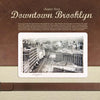 The product "Greetings from Brooklyn" by Schiffer Publishing, Ltd. features a sepia-toned vintage photo of Downtown Brooklyn on a brown and beige textured background, with historical details about Brooklyn neighborhoods and their rich past.