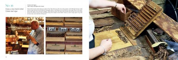 A person inspects a cigar in a shop in Key West—boxes labeled Leaf, Hand, and Rolled line the shelves as another expertly rolls cigars by hand. Discover more local experiences in "101 Things to Do in Key West" from Schiffer Publishing, Ltd.