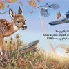 A fawn stands in autumn grass by a tree branch as a blue jay drops an acorn, with more acorns and colorful leaves nearby. This enchanting scene appears in "The Tiny Giant," a children’s nature book from Schiffer Publishing, Ltd.