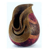 “New and Different Materials for Weaving and Coiling” by Schiffer Publishing, Ltd. features organic weaving and coiling techniques, blending textured surfaces, intricate patterns, and natural materials for unique sculptural designs.