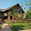 Discover "Arts & Crafts Houses" by Schiffer Publishing, Ltd.—a celebration of timeless architecture and modern comfort, showcasing restored bungalows with lush lawns and charming walkways.