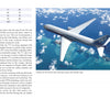 A Boeing 787 Dreamliner transport airplane from Schiffer Publishing, Ltd. is seen in flight from above, soaring over turquoise ocean waters dotted with small islands and coral reefs.