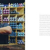 A person in a white luchador mask stands with crossed arms before shelves of spray paint, embodying the bold spirit of "Tokyo Graffiti" by Schiffer Publishing, Ltd. Text appears on the organized shelves and blank white space to the right.
