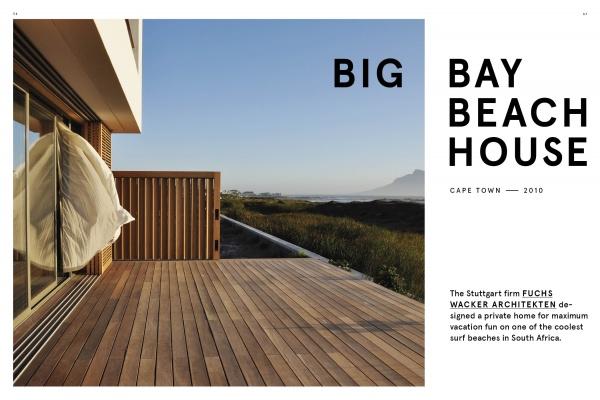 A modern wooden deck with glass doors and billowing white curtains overlooks the coast and mountains—discover homes like this in Dream Houses on the Water by Schiffer Publishing, Ltd.