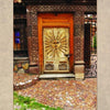 Experience the charm of San Miguel de Allende with "San Miguel's Mexican Exteriors" by Schiffer Publishing, Ltd.—a showcase of intricately carved wooden doors, sun motifs, floral details, cobblestone paths, and wrought-iron gates.