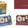 “Do You Read Me?” by Schiffer Publishing, Ltd. is a vintage toy collector's set featuring blue and maroon radios, original box, and a black-and-white photo of kids. "1950s" appears in the lower right corner of the packaging.