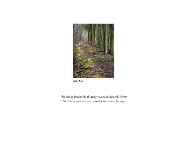 A narrow, mossy path winds through Pine Barrens trees on the cover of Pinelands by Schiffer Publishing, Ltd. Below the image, a dedication honors those who devote their lives to preserving our natural heritage.