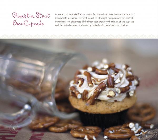 A cupcake with frosting and pretzel pieces sits by a tipped mug and scattered pretzels. Above, text highlights the Pumpkin Stout Beer Cupcake, a creative recipe from "Dare to Bake!" by Schiffer Publishing, Ltd.