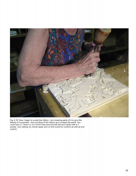 In Schiffer Publishing, Ltd.'s "Relief Carving with Nora Hall," intricate ornamental patterns are carved into wood using a mallet and chisel, demonstrating expert relief carving techniques with flowing designs.