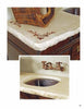 Featuring a Casting Concrete Countertops design by Schiffer Publishing, Ltd., this DIY project includes a rough stone edge, metal sink, wall-mounted bronze faucet, a wicker basket, and embroidered floral details for inspiration.