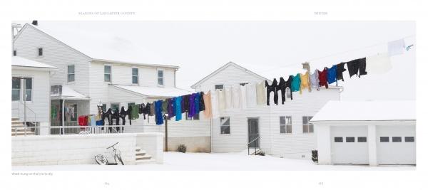 Seasons of Lancaster County by Schiffer Publishing, Ltd. captures the charm of colorful laundry on a clothesline between snowy white houses, a bicycle by a railing, and a white garage in Lancaster County's four seasons.