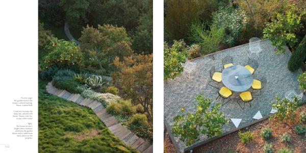 Aerial view of a private garden with stone path, gravel patio, round table, grey umbrella, and yellow chairs amid lush plants—featured in "Regional Landscape Architecture: Southern California" by Schiffer Publishing, Ltd.