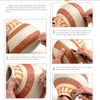 The instructional page from "Painting Gourds with the Fairy Gourdmother®" by Schiffer Publishing, Ltd. shows hands painting pottery with geometric patterns, using step-by-step images to detail bands with lines and shapes using brushes and colors.