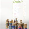 Several bottles of Americana acrylic paint in assorted colors sit on a light surface, with Schiffer Publishing, Ltd.'s "Creating Wall Pockets" book’s table of contents listing gourd painting and wall pocket projects visible in the background.
