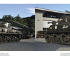 Side-by-side photos from Sherman Tank, Vol. 3 by Schiffer Publishing, Ltd. show a vintage dark green M4A2 WWII tank with white markings outdoors on pavement before a modern metal building and trees under a clear sky.
