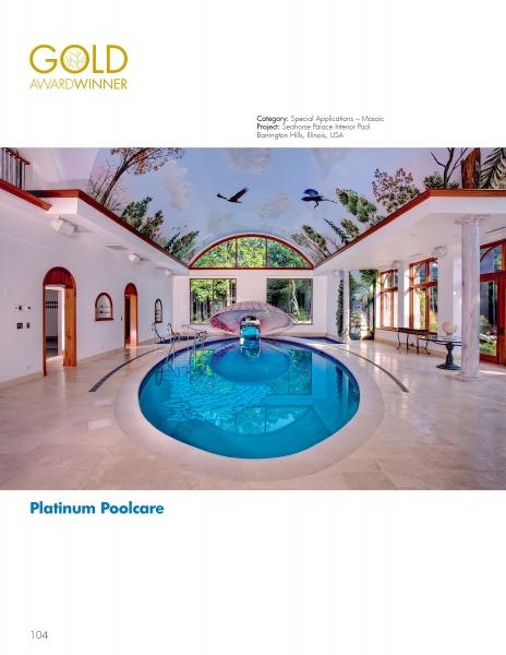 Featured in Schiffer Publishing, Ltd.'s International Award Winning Pools, Spas, & Water Environments II, this indoor pool blends round and oval sections, warm lighting, mural art, and windows to evoke an outdoor atmosphere.