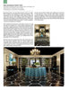 Inspired by Schiffer Publishing, Ltd.'s "Showhouses 3," this grand foyer showcases a round table with a blue tablecloth, crystal pendant chandelier, and a large mirror, set against dark walls and bold black-and-white geometric flooring.
