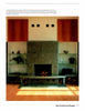Schiffer Publishing, Ltd.'s Fireplaces features a stone-framed modern fireplace with black firebox, flanked by tall wooden cabinets and white shelves with ceramics. Stacks of firewood below add both style and function for design inspiration.